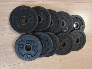 3 Mancuernas 28mm con cierres más 16 discos de 1kg