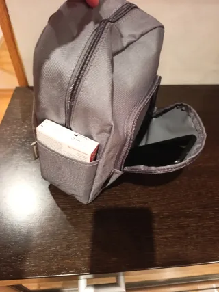 Mochila pequeña gris