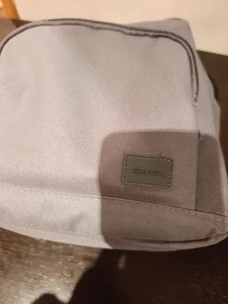 Mochila pequeña gris