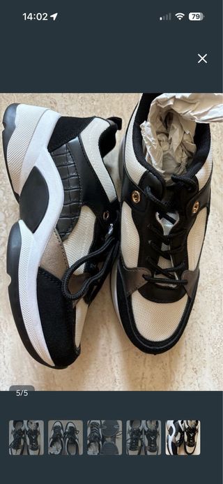 Zapatillas deportivas negras y blancas nuevas