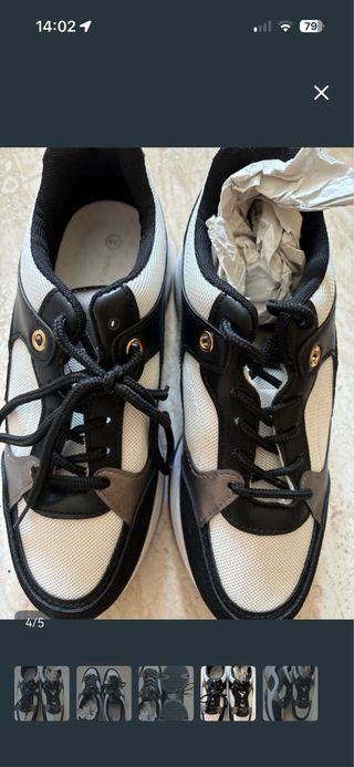 Zapatillas deportivas negras y blancas nuevas