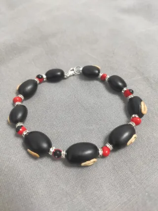 Pulsera Mucuna Negra y Huayruro