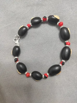 Pulsera Mucuna Negra y Huayruro