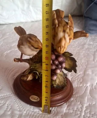 Figura de porcelana de pájaros