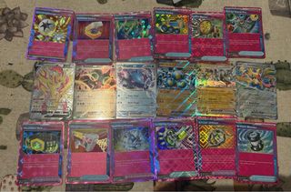 2503 Cartas Pokémon TCG+Álbums Charizard y lucario