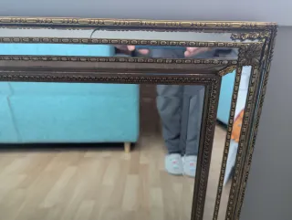 Espejo antiguo dorado y transparente