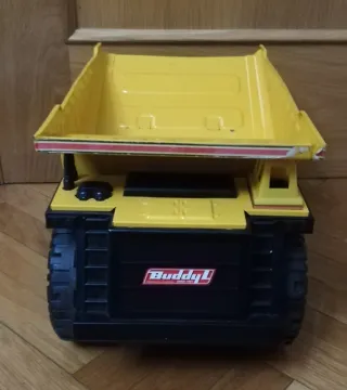 Camión volquete amarillo para jugar