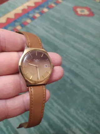 Reloj Cupillard de cuerda dorado