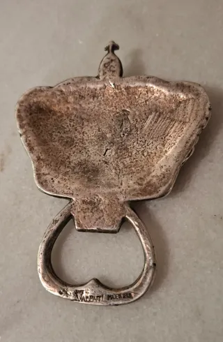 Antiguo abrebotellas Valenti