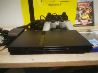 Sony PS2 con caja y juegos