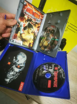 Sony PS2 con caja y juegos