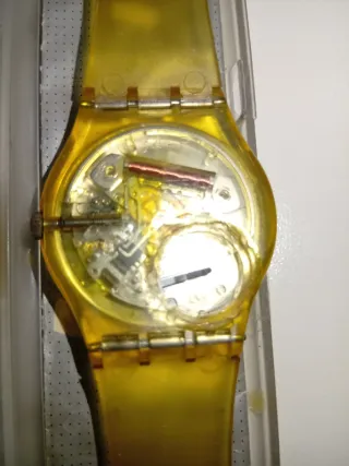 Swatch vintage giallo e argento con scatola e gara