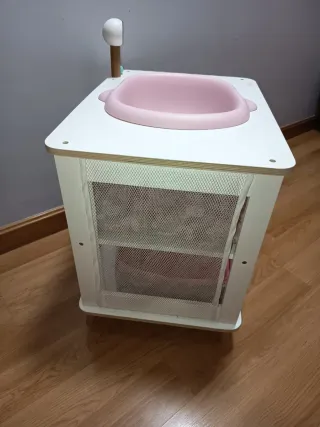 Cambiador de madera de juguete.