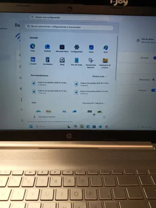 Ordenador HP y cargador