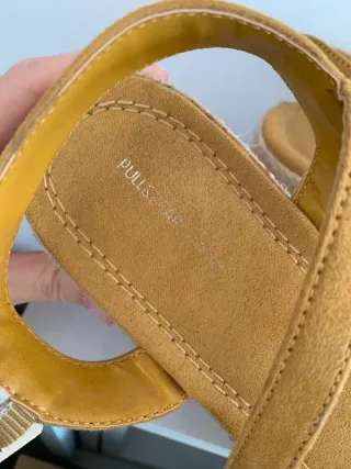 Cuñas amarillas con flecos