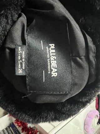 Abrigo de pelo negro