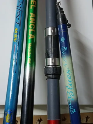 Lote 8 cañas de pescar se vende o se cambian