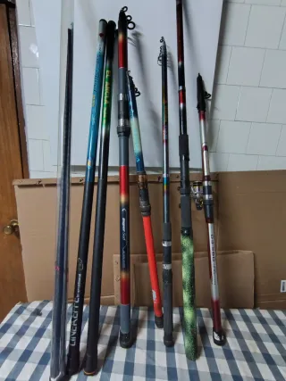 Lote 8 cañas de pescar se vende o se cambian