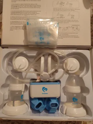 Lote: Sacaleches, esterilizador y calentador.