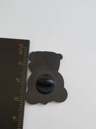 Spilla panda con secchiello di popcorn