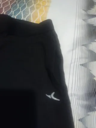 Mayas negras con bolsillos y tobillos elásticos