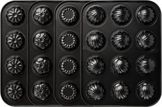 Juego de 4 moldes antiadherentes acero cupcakes
