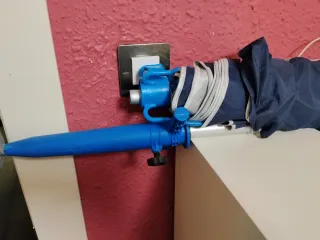 Sombrilla y silla de playa