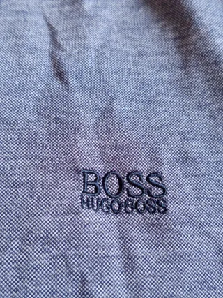 Dos polos de chico uno BOSS y otro Zara, talla M