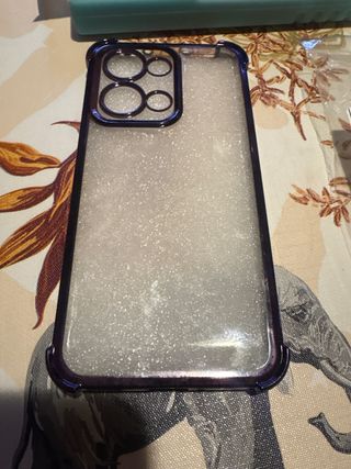 Funda móvil transparente con purpurina morado