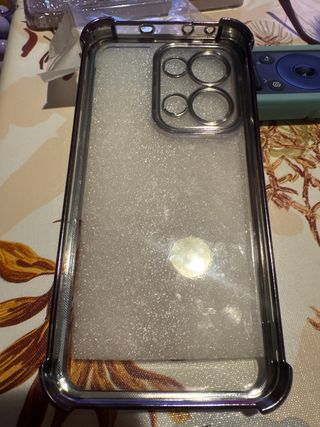 Funda móvil transparente con purpurina morado