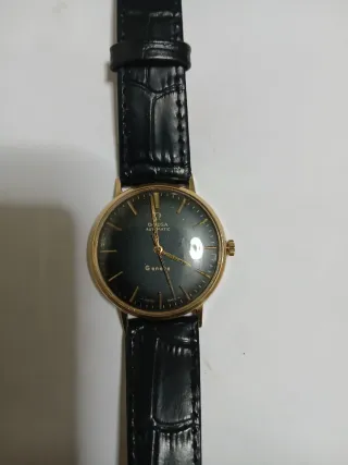 Omega Genève  18k oro