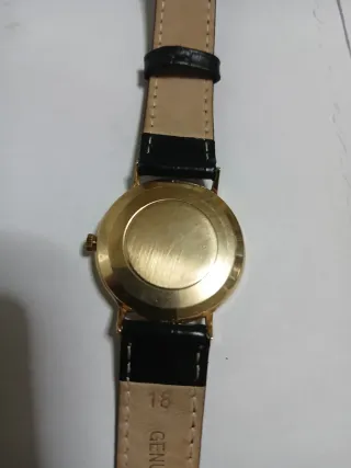 Omega Genève  18k oro