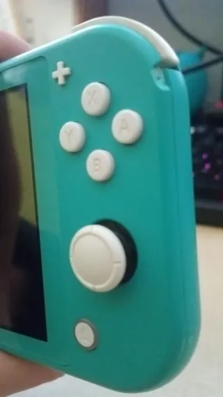 Nintendo Switch Lite Turquesa + 2 Juegos