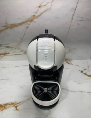 Cafetera Dolce Gusto Blanca y Negra