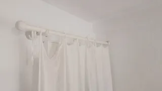 Barra per tende con tendina