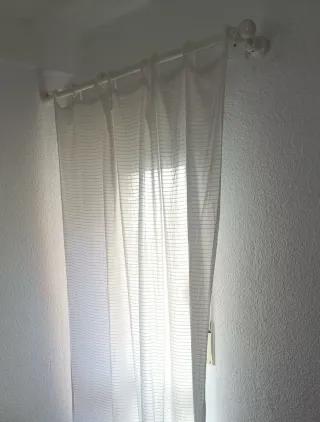 Barra per tende con tendina