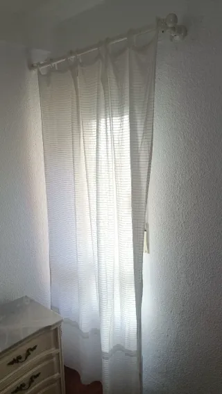 Barra per tende con tendina