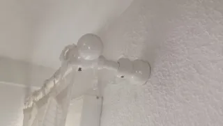 Barra per tende con tendina