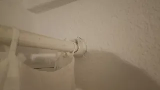 Barra per tende con tendina