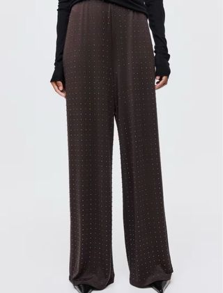 Pantalón de punto con strass sin estrenar