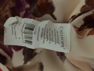 Blusa panna con fiori viola