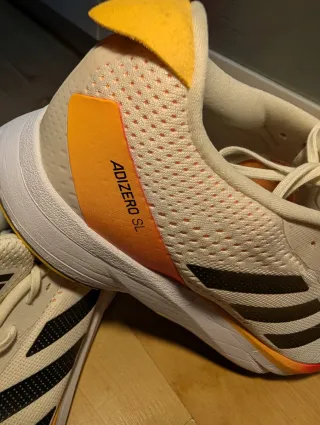 Zapatillas Adidas Adizero SL Blancas Naranja