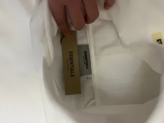 Felpa Essentials con stampa tagli s ma sta anche M