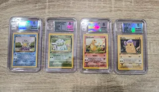 Cartas Pokémon iniciales Base Set Español grade 8