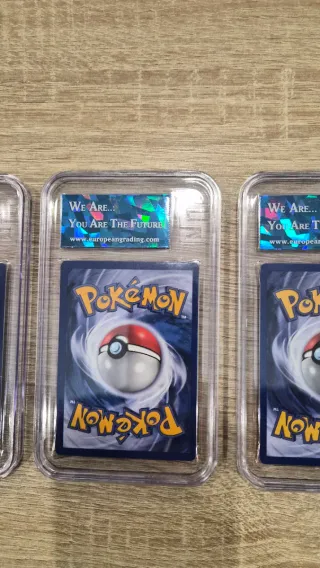 Cartas Pokémon iniciales Base Set Español grade 8