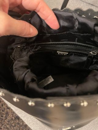 Borsa Carpisa secchiello nera con borchie