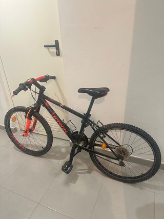 Bicicleta Btwin Negra y Naranja