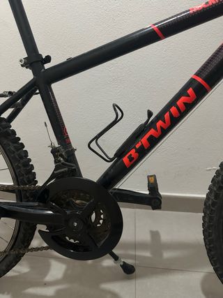 Bicicleta Btwin Negra y Naranja