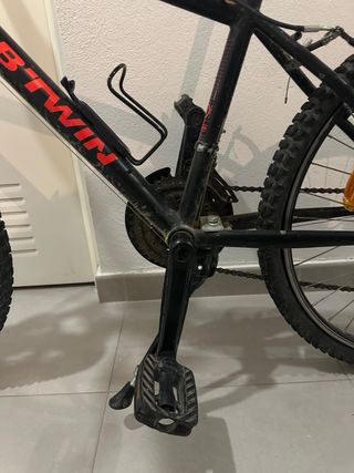 Bicicleta Btwin Negra y Naranja