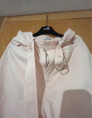 Vaqueros Tiffosi rectos con cinturón rosa